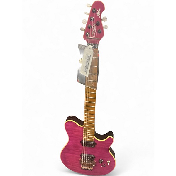Used Sterling by Music Man AX40 trans pink Solid Body Electric Guitar