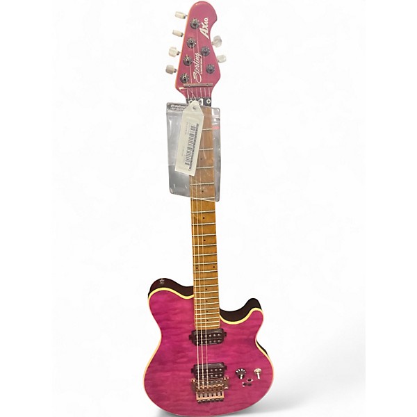 Used Sterling by Music Man AX40 trans pink Solid Body Electric Guitar