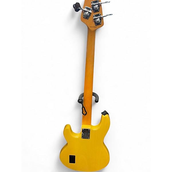 Used Sterling by Music Man RAY24CA Yellow Electric Bass Guitar