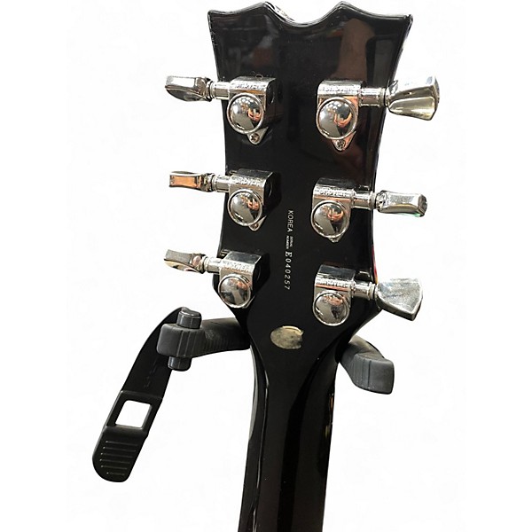 Used Dean EVO Tiger Eye Quilt Top Solid Body Electric Guitar