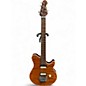 Used Ernie Ball Music Man Axis One Piece Translucent Gold Solid Body Electric Guitar thumbnail