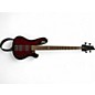 Used Schecter Omen 4 Crimson Red Trans Electric Bass Guitar thumbnail