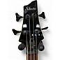 Used Schecter Omen 4 Crimson Red Trans Electric Bass Guitar