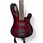 Used Schecter Omen 4 Crimson Red Trans Electric Bass Guitar