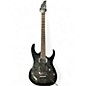 Used Ibanez RG370QMSP RG Series Trans Black Solid Body Electric Guitar thumbnail
