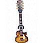 Used 2022 Gibson Les Paul Tribute Honey Burst Solid Body Electric Guitar thumbnail