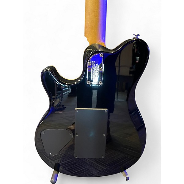 Used 2006 Ernie Ball Music Man Axis Translucent Blue Solid Body Electric Guitar