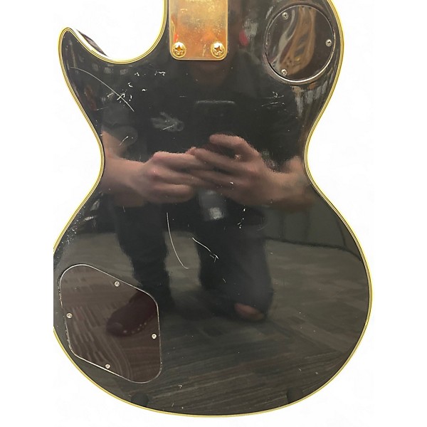 Vintage 1970s Aspen Les Paul Black and Gold Solid Body Electric Guitar
