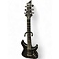 Used Schecter Guitar Research Hellraiser C1 Hybrid Trans Black Solid Body Electric Guitar thumbnail