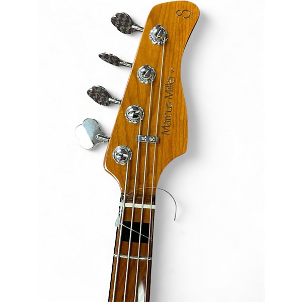 Used Sire marcus miller v5 4 string champagne gold metallic Electric Bass Guitar