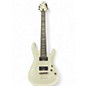Used Schecter Guitar Research Demon 7 String Black and White Solid Body Electric Guitar thumbnail