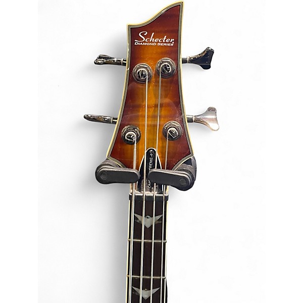 Used Schecter Guitar Research Omen Extreme 4 String Trans Amber Electric Bass Guitar