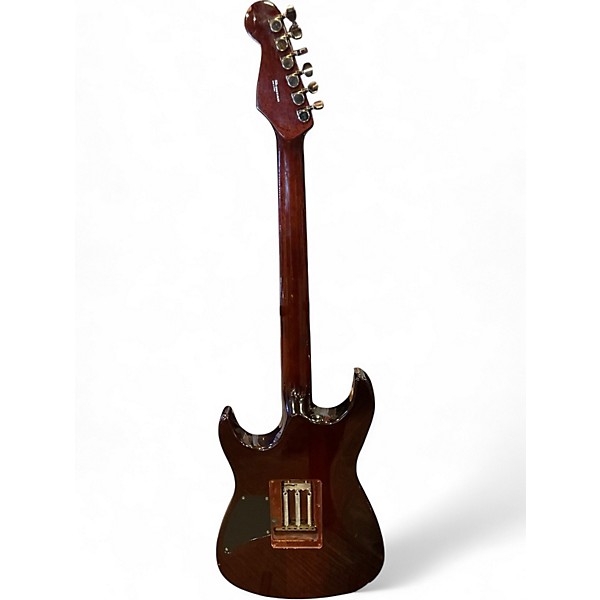 Used 2005 Fender Showmaster Trans Amber Solid Body Electric Guitar