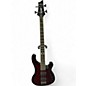 Used Schecter Guitar Research Diamond Series 004 Bass Crimson Red Trans Electric Bass Guitar thumbnail