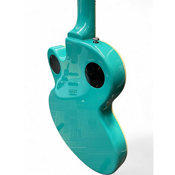 Used 2002 Epiphone Wildkat Turquoise Hollow Body Electric Guitar