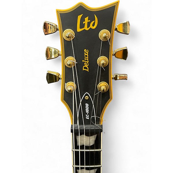 Used ESP LTD EC1000 Deluxe Black and Gold Solid Body Electric Guitar