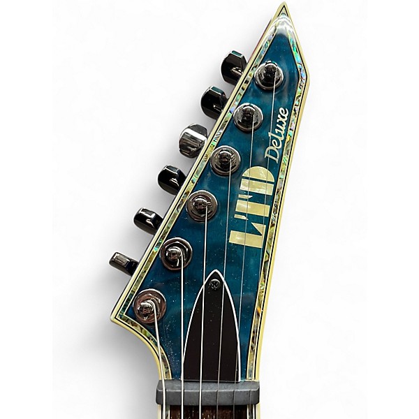 Used ESP LTD MH1000 Deluxe See Thru Blue Solid Body Electric Guitar