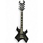 Used B.C. Rich Deluxe Series Warlock Black Solid Body Electric Guitar thumbnail
