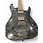 Used ESP LTD MH1000 Deluxe Trans Black Solid Body Electric Guitar thumbnail