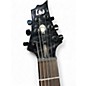 Used ESP LTD MH1000 Deluxe Trans Black Solid Body Electric Guitar