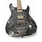 Used ESP LTD MH1000 Deluxe Trans Black Solid Body Electric Guitar