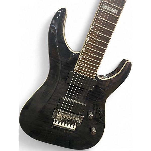Used ESP LTD H1007 7 String with Tremolo Trans Black Solid Body Electric Guitar