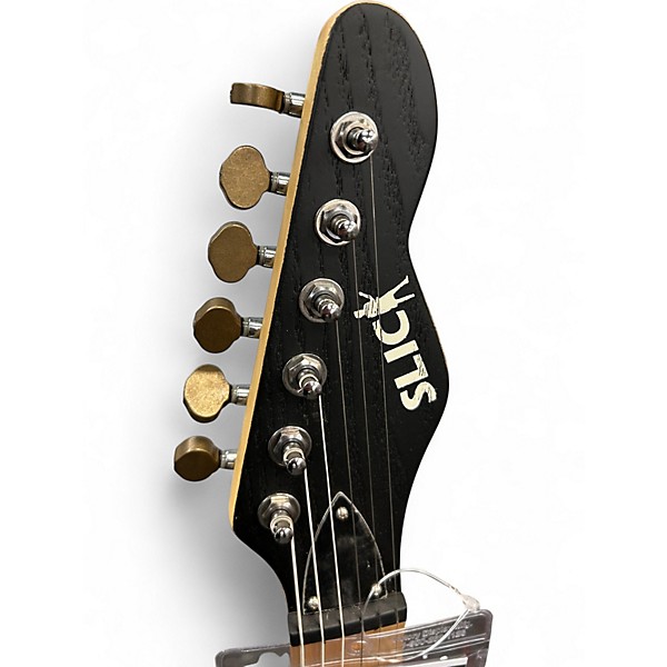 Used Slick SL55 Trans Black Solid Body Electric Guitar