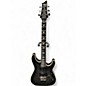 Used Schecter Guitar Research Omen Extreme 6 Floyd Rose Left Handed Trans Black Electric Guitar thumbnail