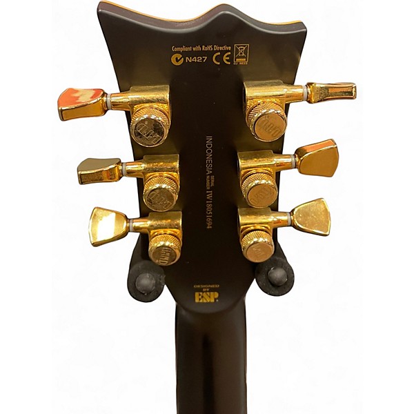 Used ESP LTD EC1000 Deluxe Black and Gold Solid Body Electric Guitar