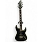 Used Schecter Guitar Research Omen Extreme 6 Floyd Rose Trans Black Solid Body Electric Guitar thumbnail