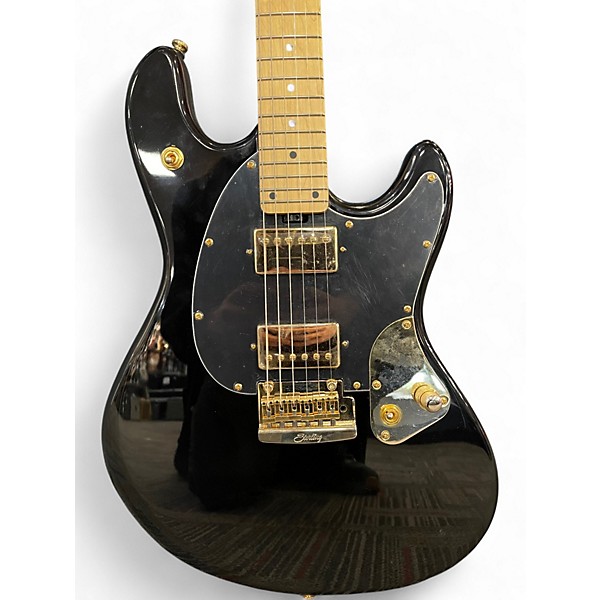 Used Sterling by Music Man Jared Dines Signature Stingray Black and Gold Solid Body Electric Guitar