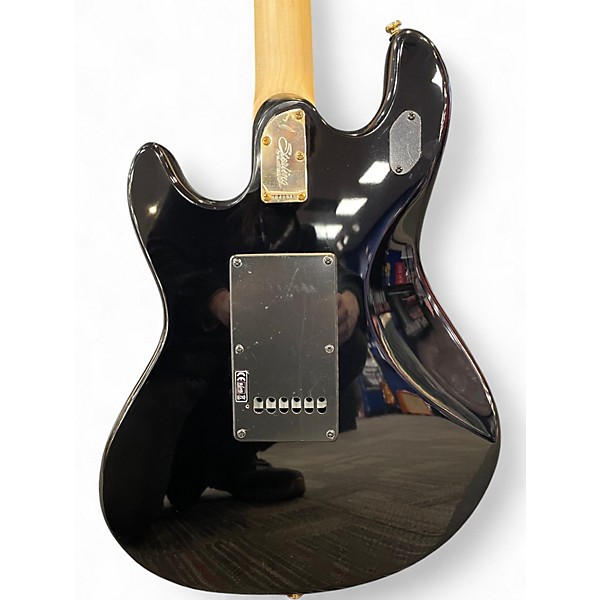 Used Sterling by Music Man Jared Dines Signature Stingray Black and Gold Solid Body Electric Guitar
