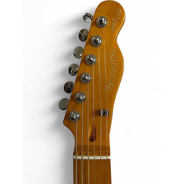 Used Hohner Madcat Trans Amber Solid Body Electric Guitar