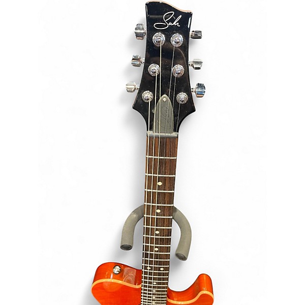 Used Suhr OSO Short-Scale Trans Orange Solid Body Electric Guitar