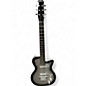 Used Silvertone 1303/U2 Silverburst Solid Body Electric Guitar thumbnail