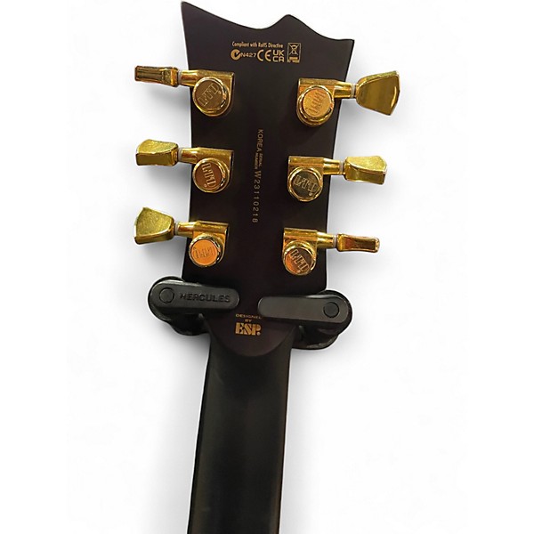 Used ESP LTD EC1000 Deluxe Black and Gold Solid Body Electric Guitar