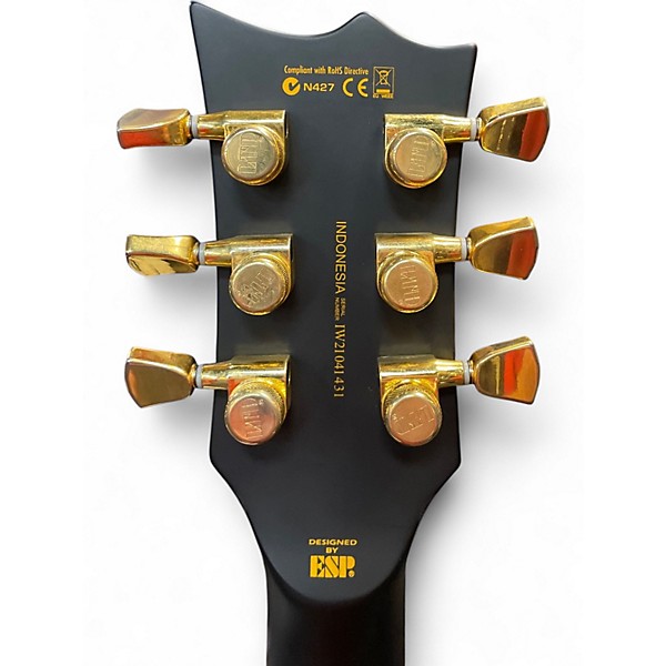 Used 2021 ESP LTD EC1000 Deluxe Black and Gold Solid Body Electric Guitar