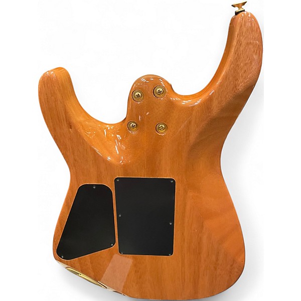 Used 2022 Charvel Pro-Mod DK24 HH FR M Mahogany with Quilt Maple Dark Amber Solid Body Electric Guitar
