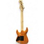 Used 2022 Charvel Pro-Mod DK24 HH FR M Mahogany with Quilt Maple Dark Amber Solid Body Electric Guitar