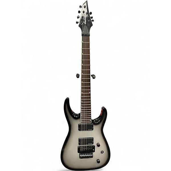 Used Jackson X Series SLATXSD 3-7 Soloist Silverburst Baritone Guitars