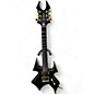 Used B.C. Rich Trace Warbeast T Black and Gold Solid Body Electric Guitar thumbnail