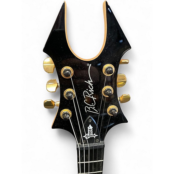 Used B.C. Rich Trace Warbeast T Black and Gold Solid Body Electric Guitar