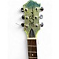 Used B.C. Rich Mockingbird Translucent Green Solid Body Electric Guitar