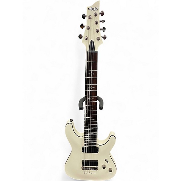 Used Schecter Guitar Research Demon 7 String Antique White Solid Body Electric Guitar
