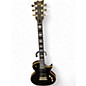 Used ESP LTD EC1000 Deluxe Black and Gold Solid Body Electric Guitar thumbnail