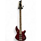 Used Mitchell MB200 Candy Apple Red Electric Bass Guitar thumbnail