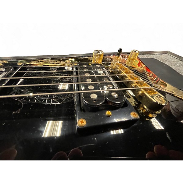 Used Jackson RR5 Randy Rhoads Black and Gold Solid Body Electric Guitar