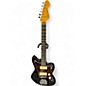Used Vintage Reissued Seres V65 Black Solid Body Electric Guitar thumbnail