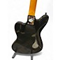 Used Vintage Reissued Seres V65 Black Solid Body Electric Guitar