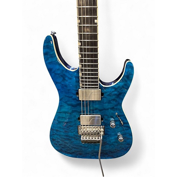 Used ESP LTD MH1000 Deluxe Trans Blue Solid Body Electric Guitar